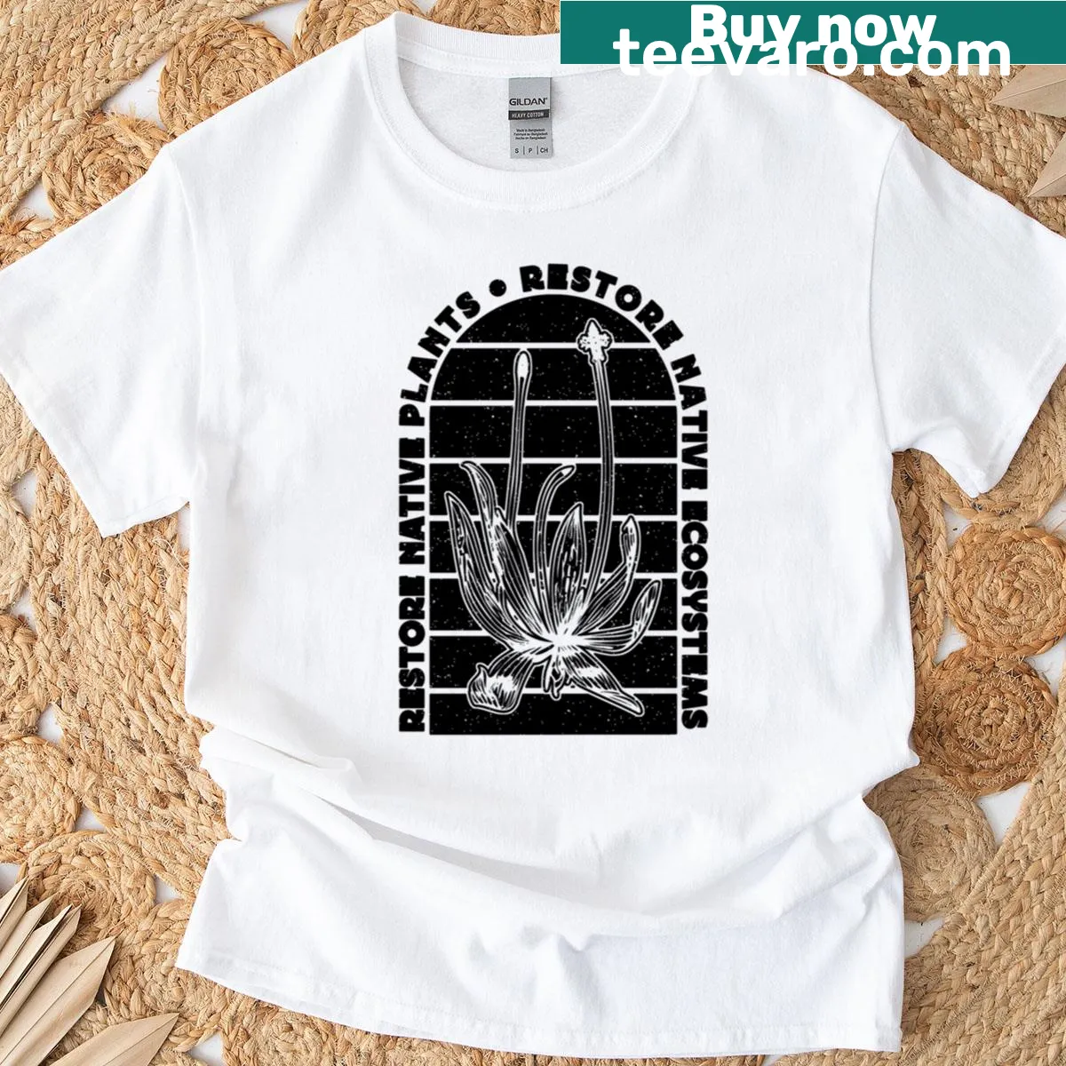 Oversized T-shirt featuring a milkweed and butterfly illustration — on a men's t-shirt