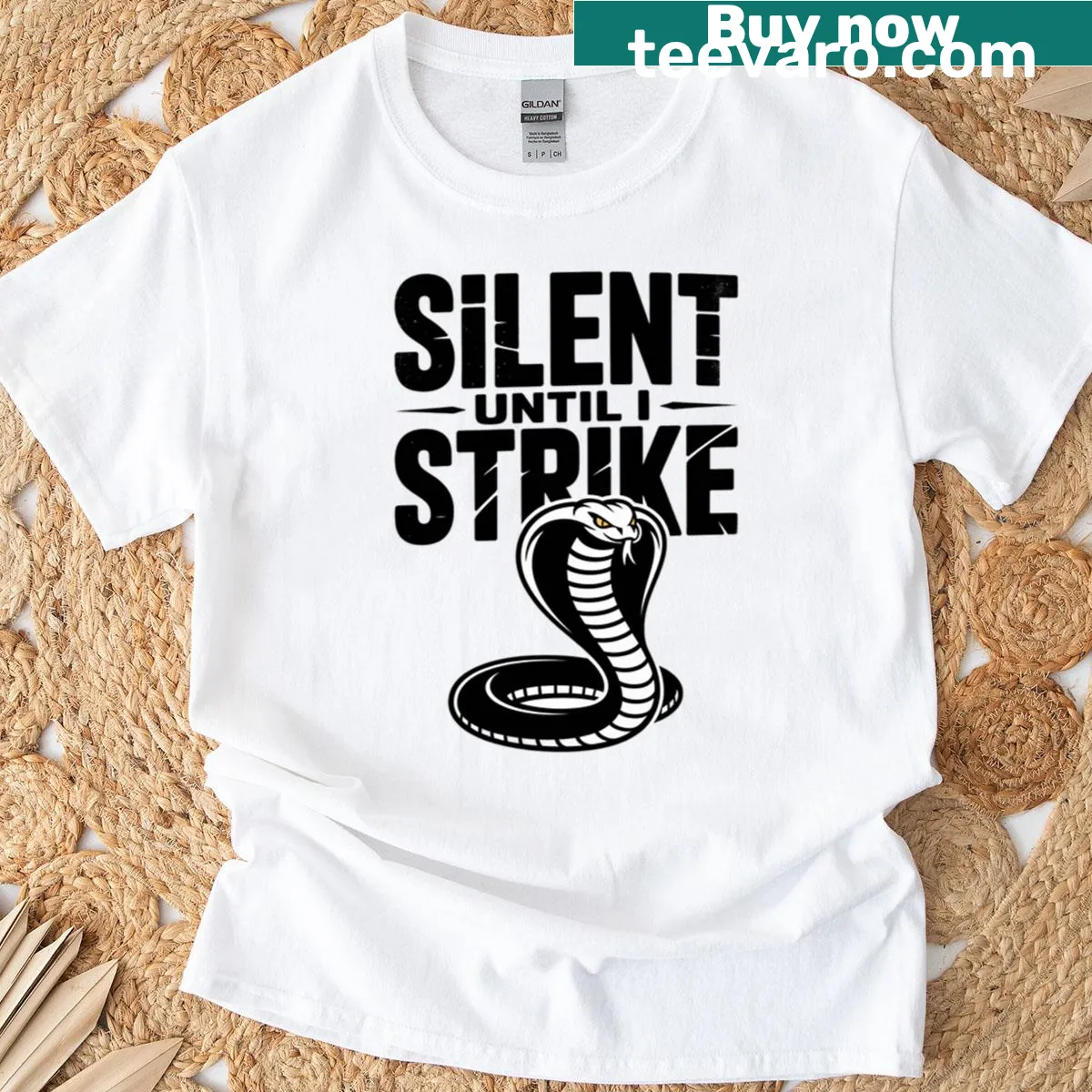 Bold cobra graphic in black and white on T-shirt — on a men's t-shirt