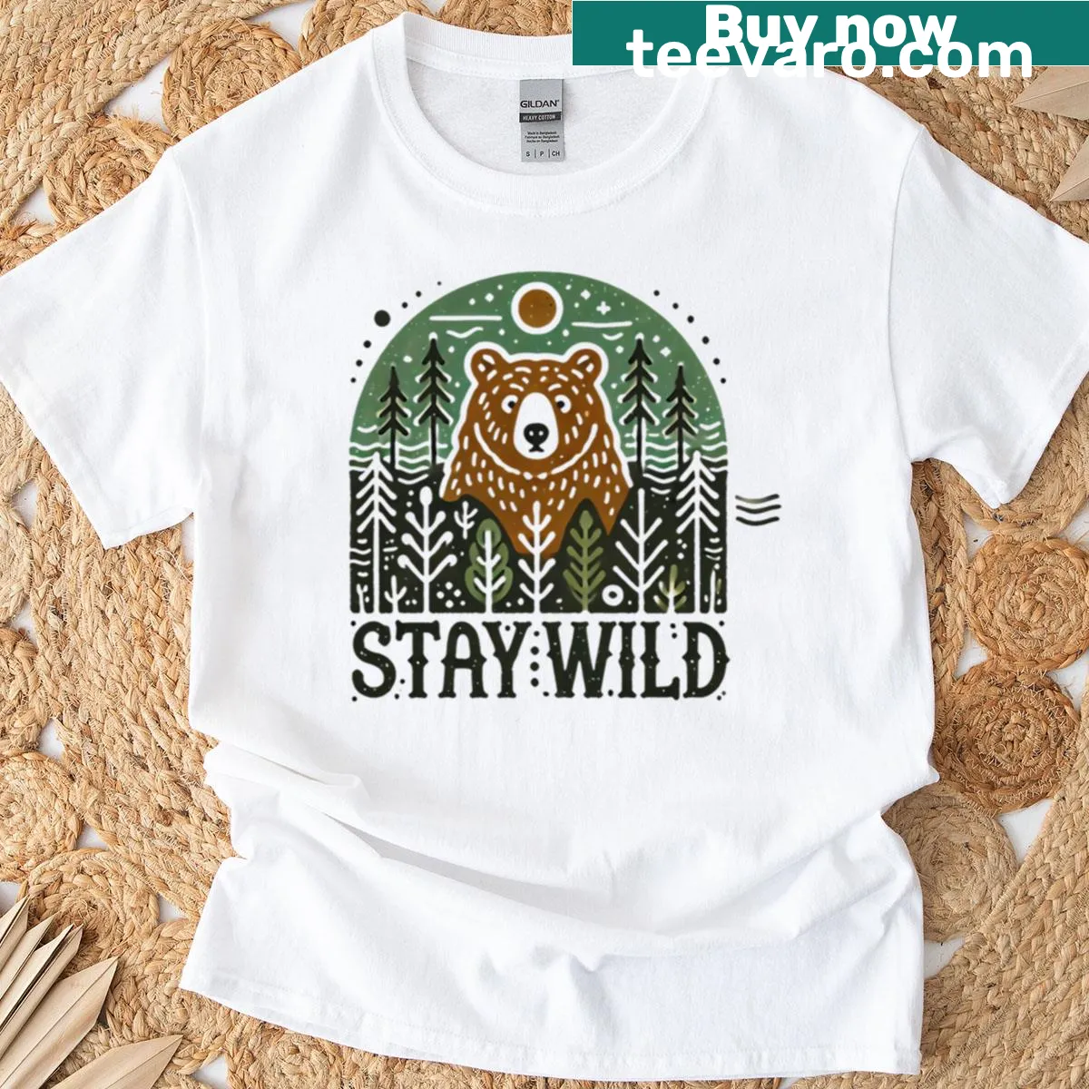 Vintage badge design T-shirt featuring a bear and forest scenery, ideal for nature lovers. — on a men's t-shirt
