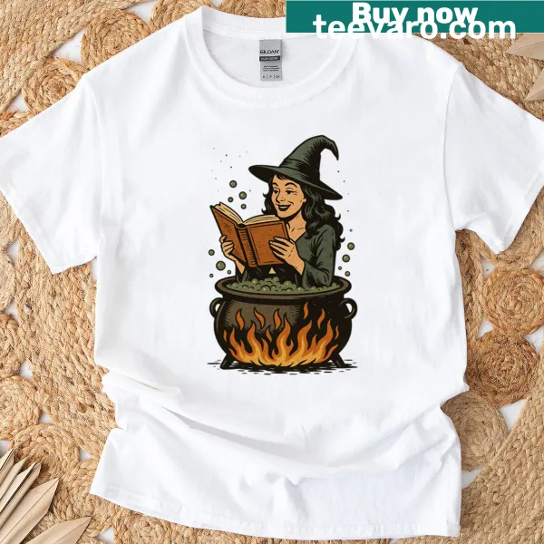 Vintage comic witch reading in a cauldron on T-shirt