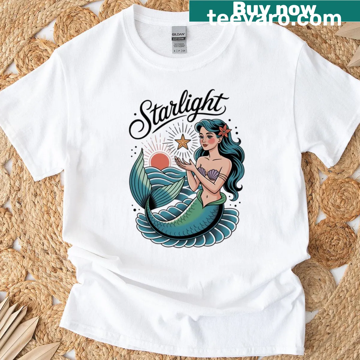 Vintage mermaid graphic tee with sunset and ocean waves illustration — on a men's t-shirt