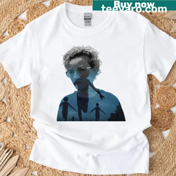 Graphic t-shirt featuring 'Weapons By Zach Cregger' text