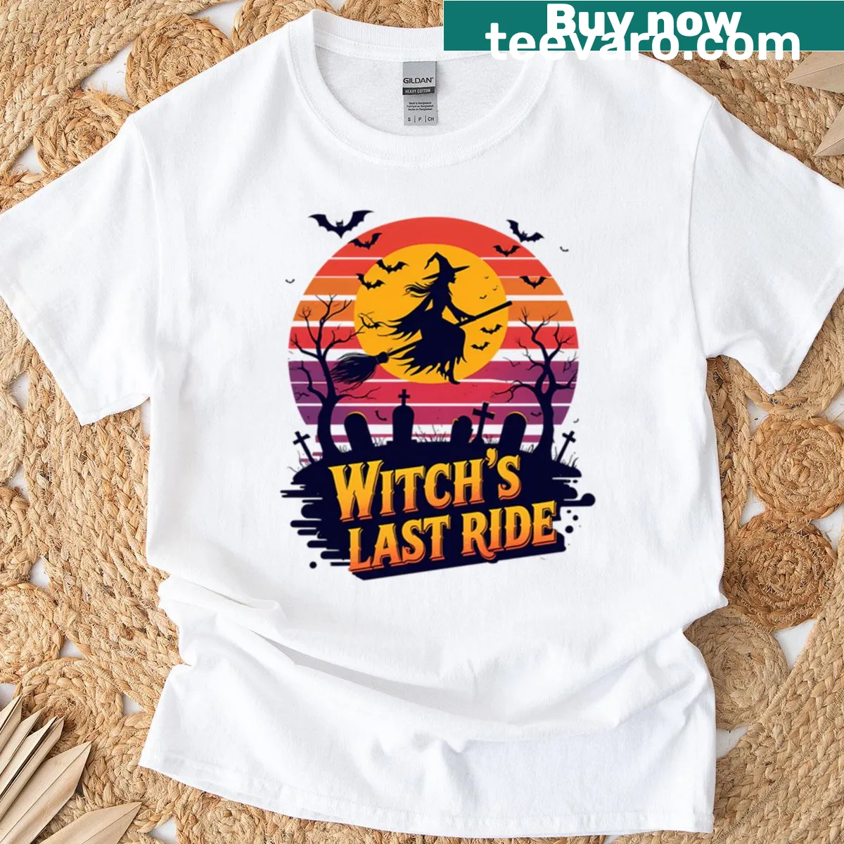 Retro Halloween T-shirt with flying witch, bats, and graveyard design — on a men's t-shirt