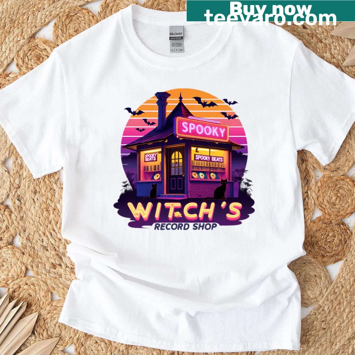 Retro Halloween T-shirt featuring a witch's record shop illustration — on a men's t-shirt