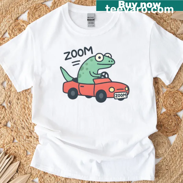 Cute cartoon T-shirt with a lizard driving a vehicle