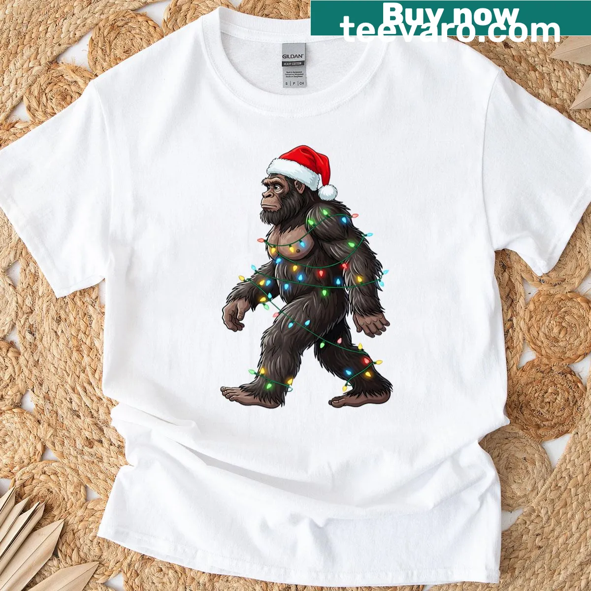 Funny Bigfoot Christmas shirt with festive lights — on a men's t-shirt