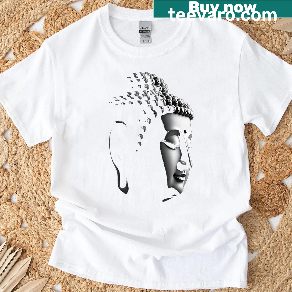 T-shirt featuring a serene Buddha head illustration — on a men's t-shirt