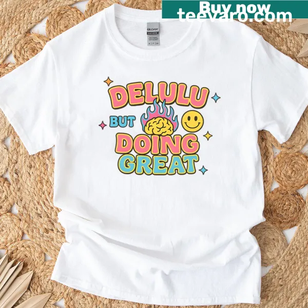 Graphic of a brain with the text 'Delulu But Thriving' on a T-shirt