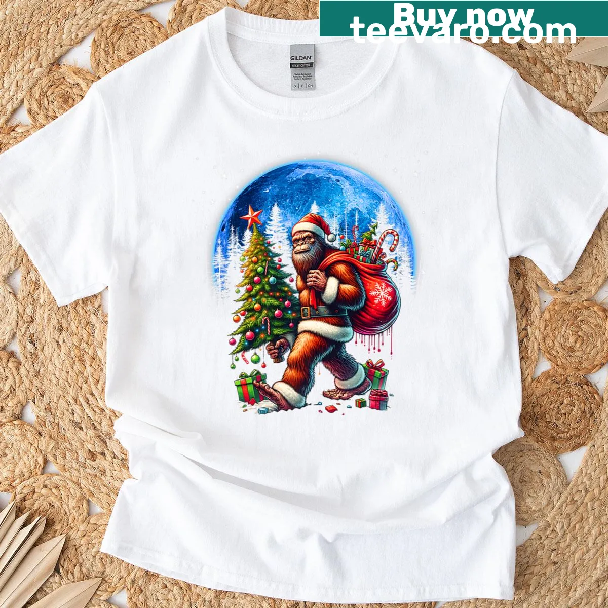 Funny Bigfoot Christmas T-shirt with tree and Santa hat illustration — on a men's t-shirt