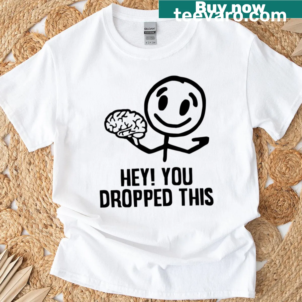 Sarcastic T-shirt with text saying 'Hey You Dropped This Brain.' — on a men's t-shirt