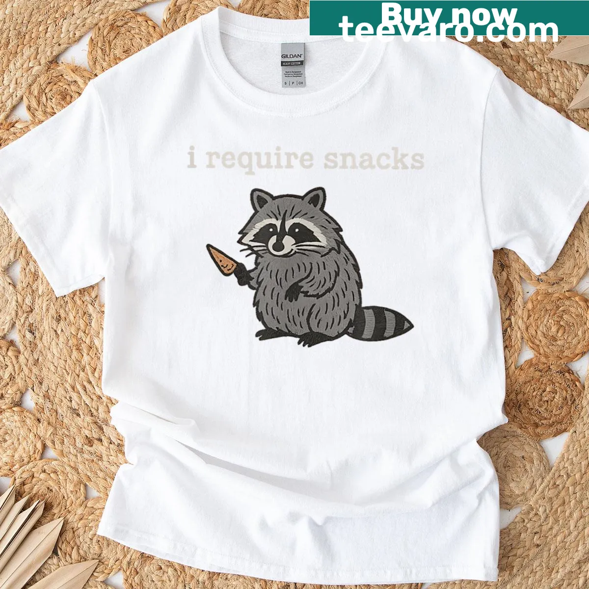 Funny raccoon t-shirt with the text 'I Require Snacks' and an illustrated raccoon — on a men's t-shirt