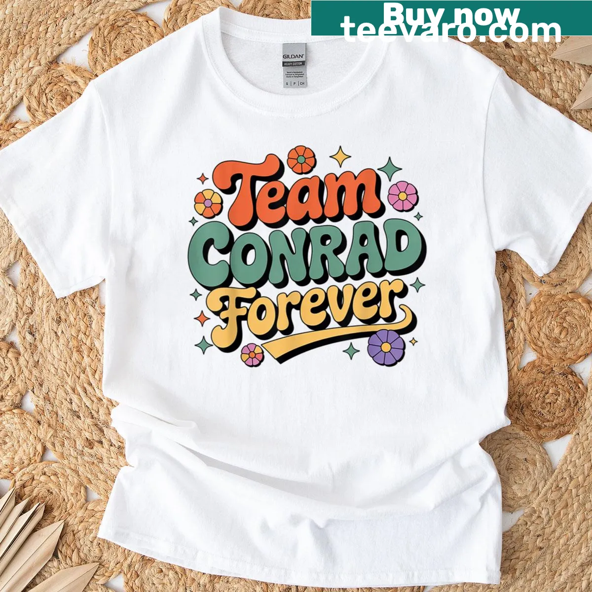 Vintage-inspired T-shirt with groovy floral design and Team Conrad text — on a men's t-shirt