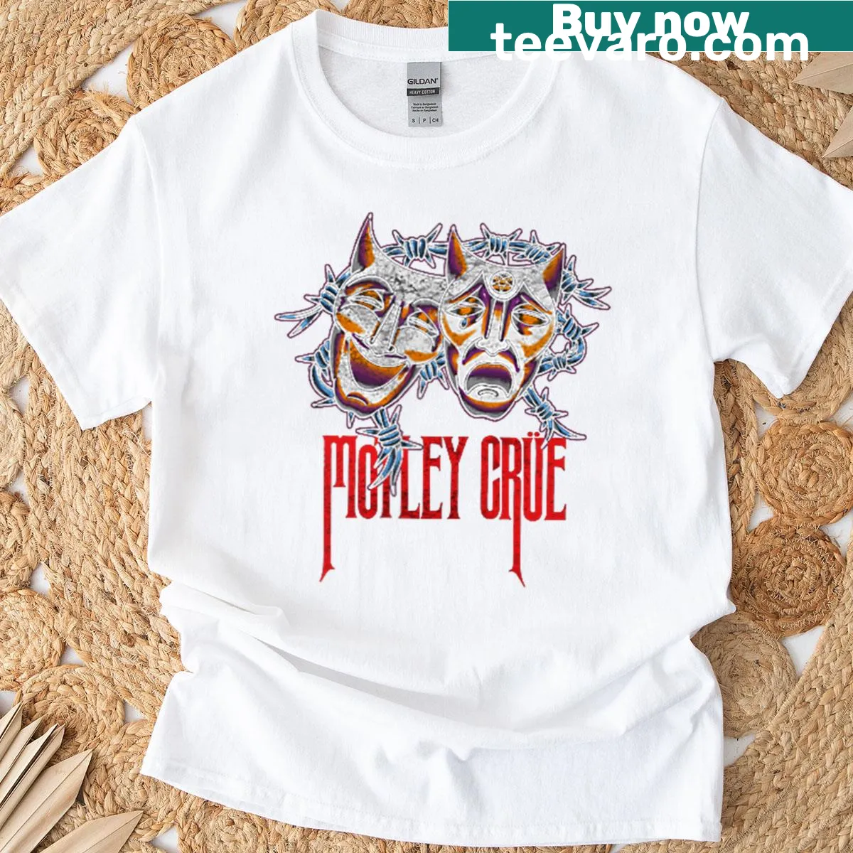 Rock music-themed T-shirt featuring barbed wire and Mtley Cre design — on a men's t-shirt