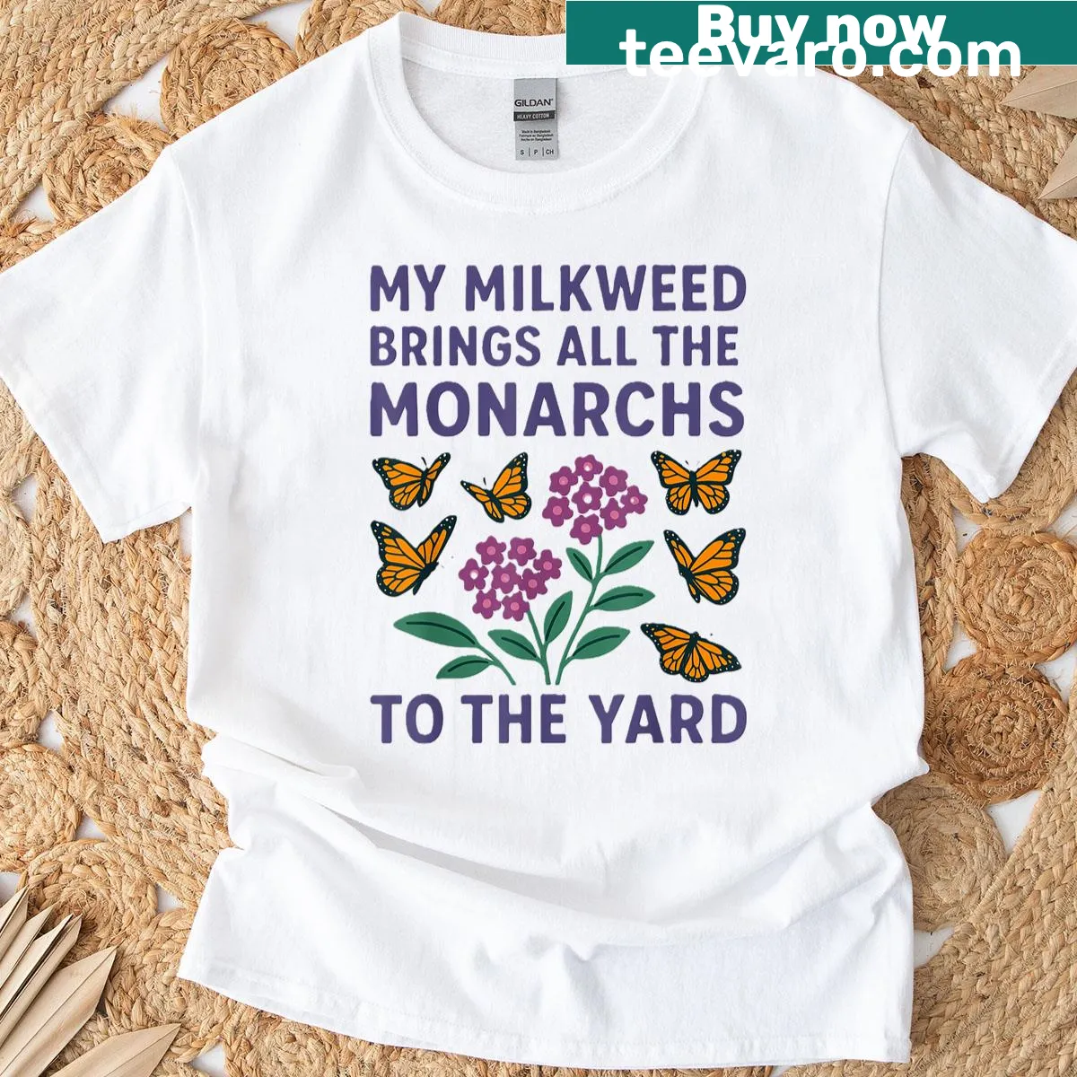 Illustrated t-shirt featuring milkweed and monarch butterflies — on a men's t-shirt
