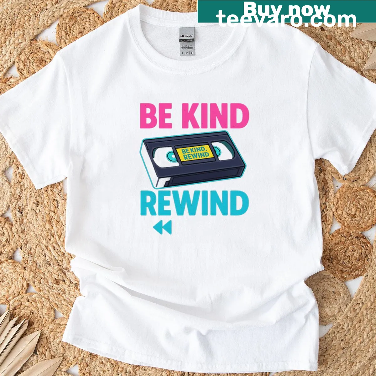VHS tape graphic t-shirt with the phrase Be Kind Rewind — on a men's t-shirt