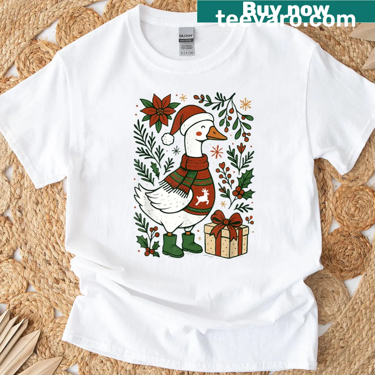Funny Christmas shirt featuring a silly goose and boho floral design. — on a men's t-shirt