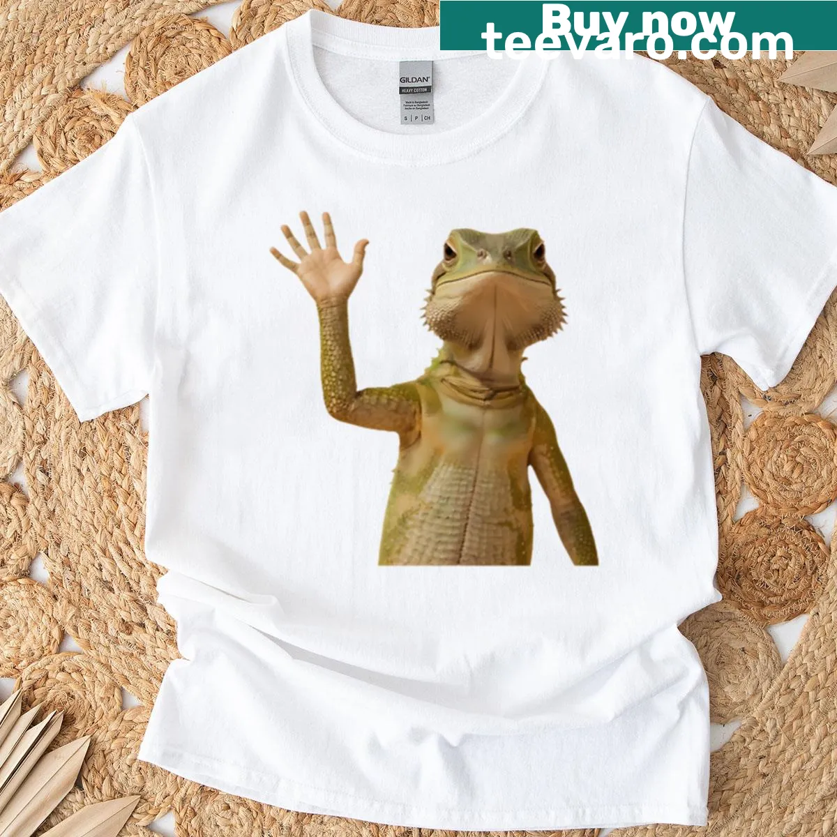 Playful oversized t-shirt featuring a waving lizard design — on a men's t-shirt