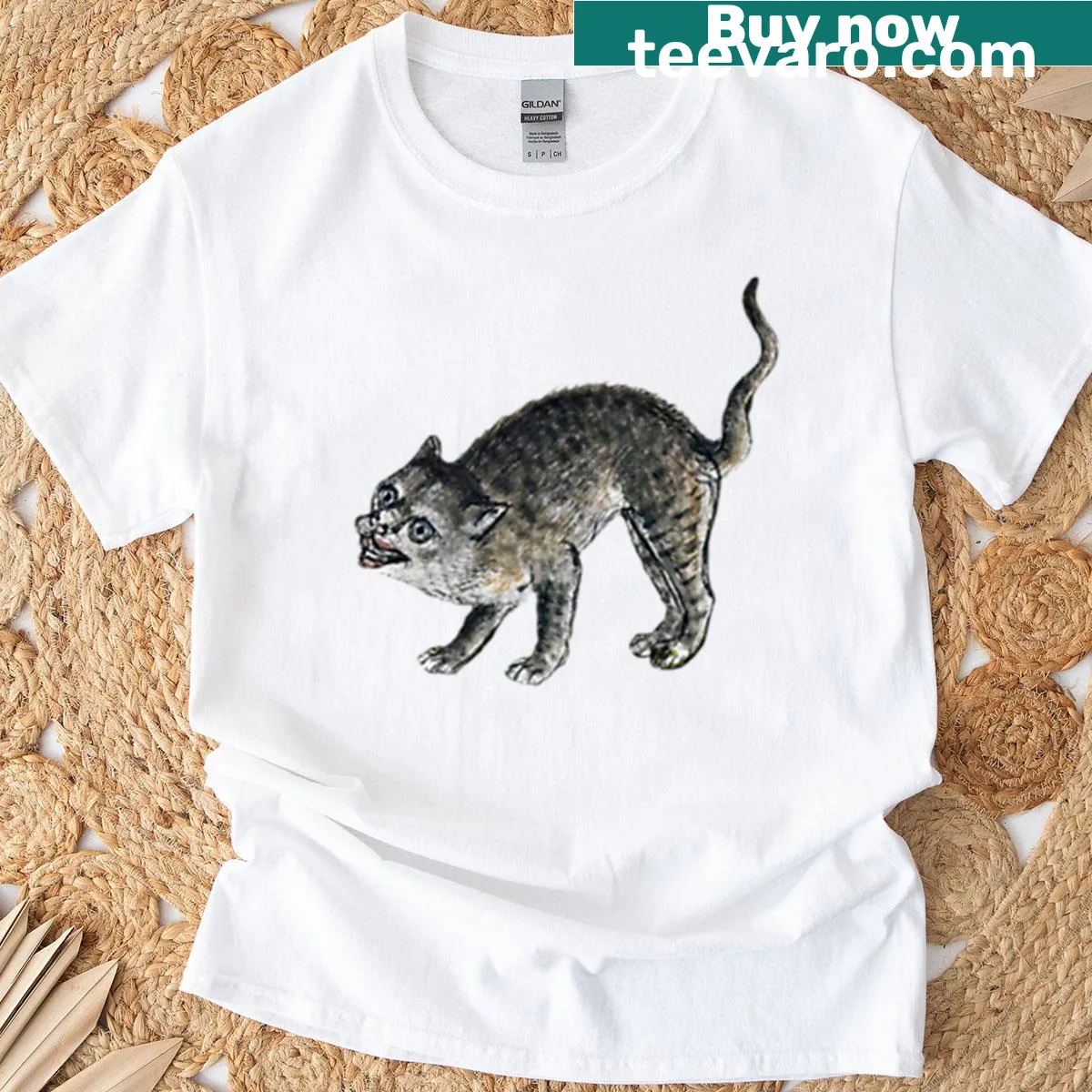 Angry medieval cat graphic T-shirt — on a men's t-shirt