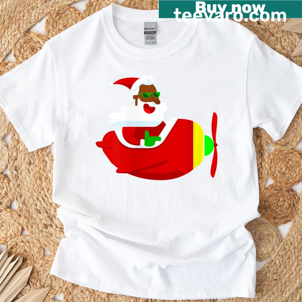 Funny Christmas T-shirt featuring African Santa in aviator gear — on a men's t-shirt