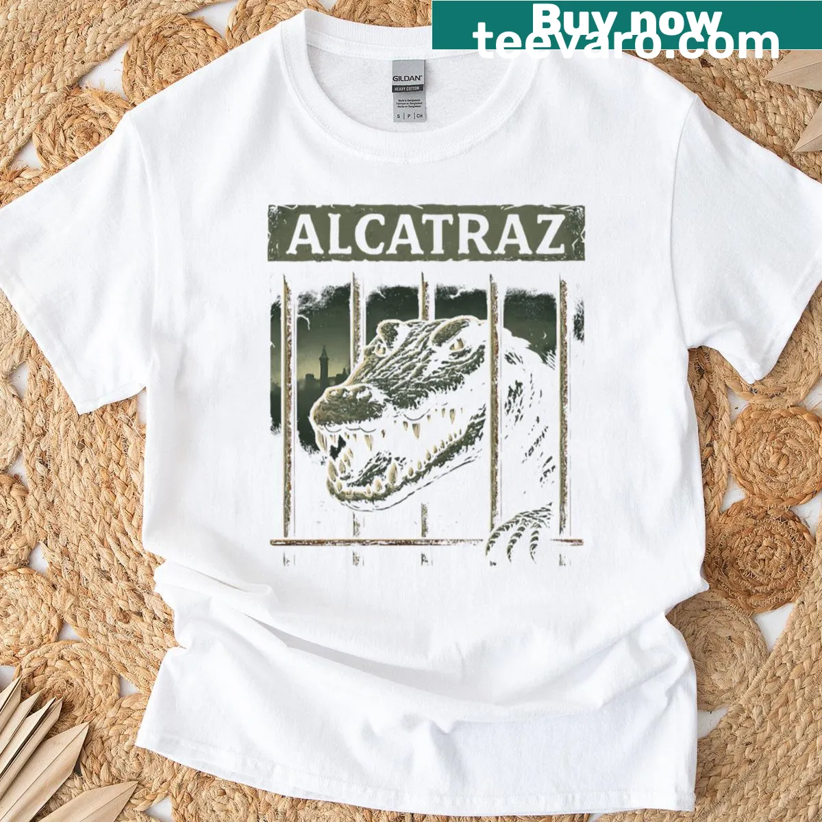 Illustrative T-shirt featuring an alligator in an Alcatraz setting — on a men's t-shirt