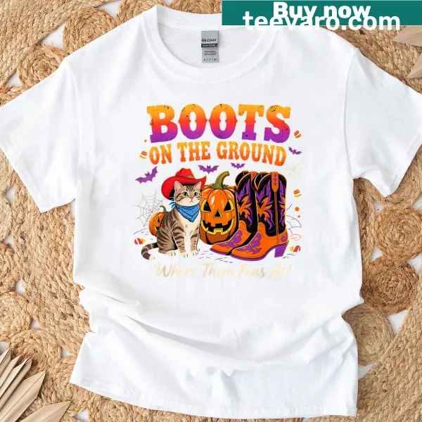 Halloween T-shirt featuring a cowboy cat design with a pumpkin