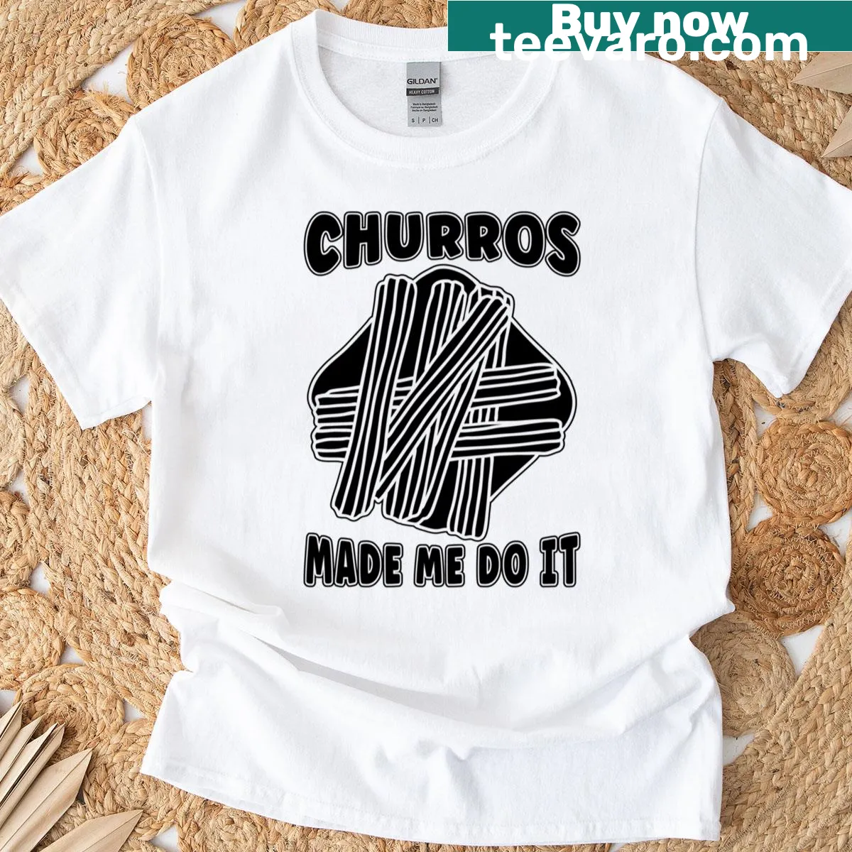 Oversized T-shirt with humorous saying 'Churros Made Me Do It' — on a men's t-shirt