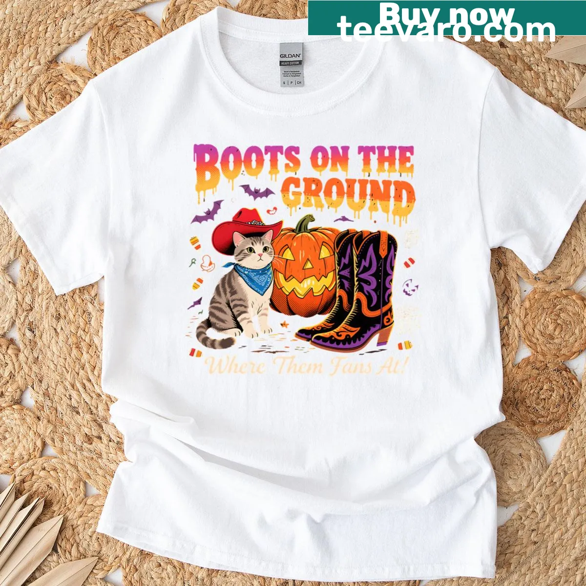 Playful cowboy cat t-shirt with Halloween pumpkin theme — on a men's t-shirt