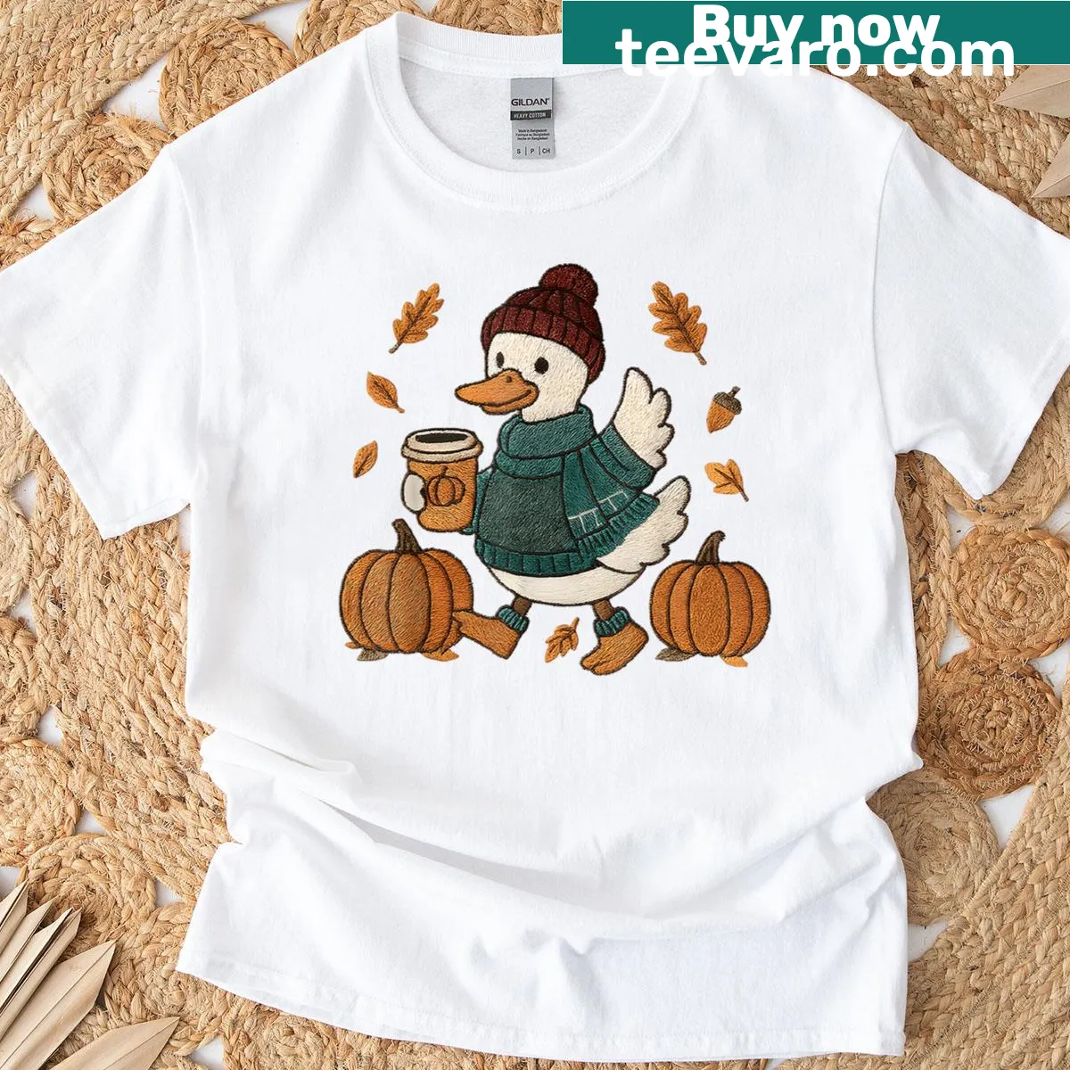Cute fall duck enjoying pumpkin spice coffee graphic — on a men's t-shirt