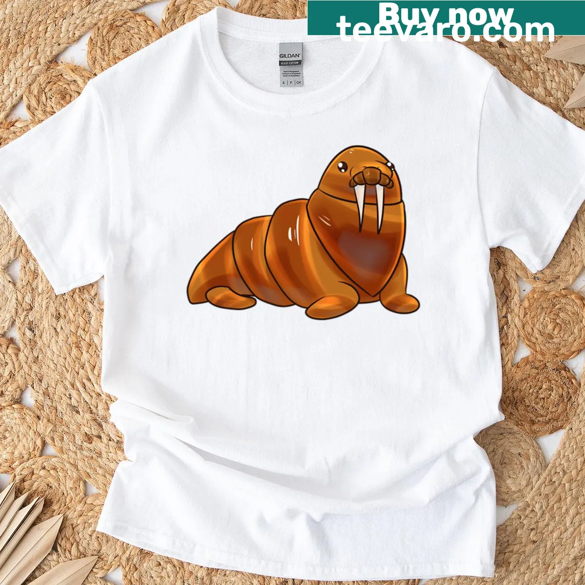 Cartoon walrus with croissant graphic T-shirt — on a men's t-shirt