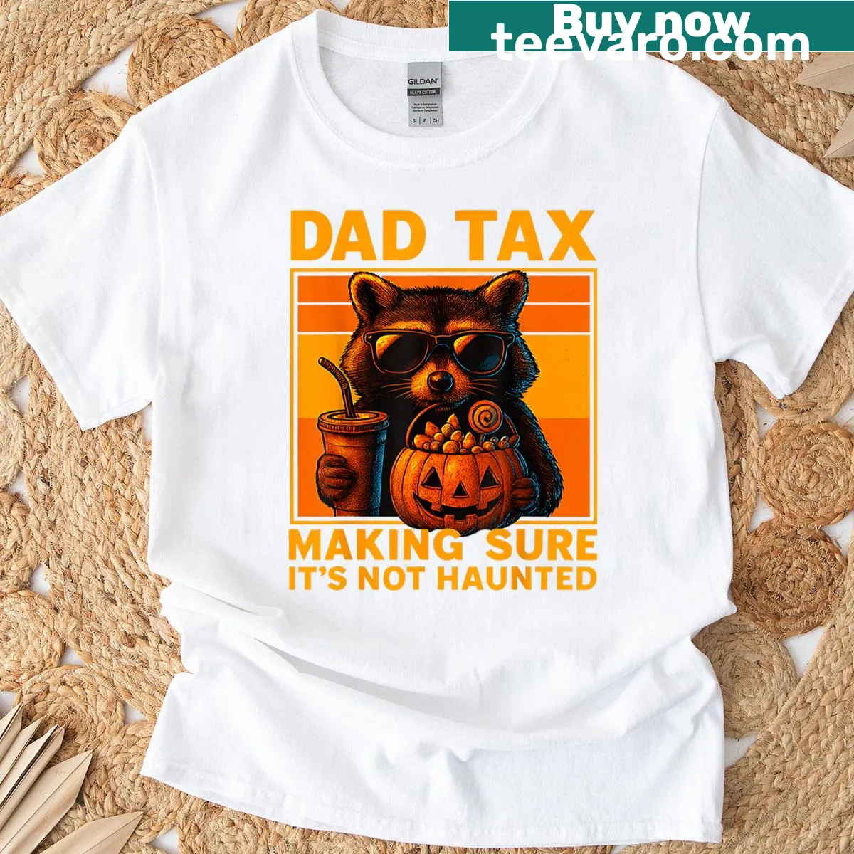 Halloween shirt featuring a cartoon raccoon and spooky text. — on a men's t-shirt