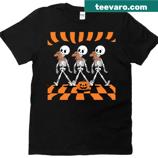 Funny Halloween design with dancing skeletons and a dachshund.