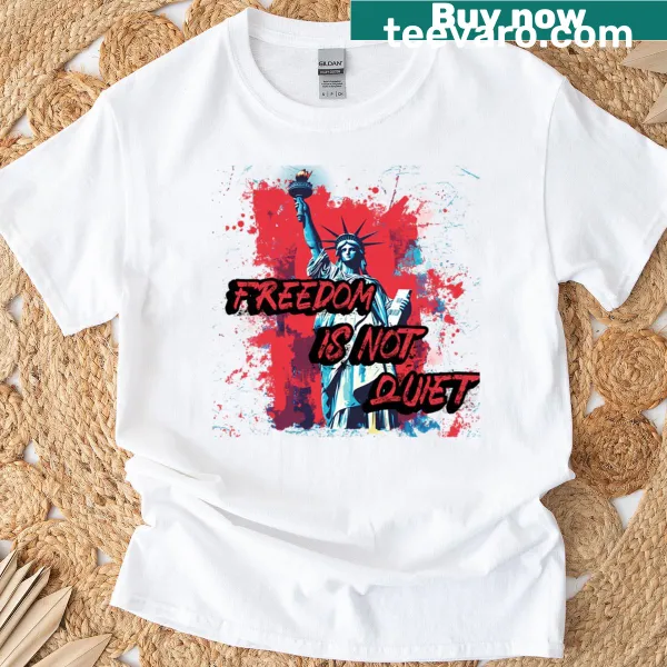 Oversized t-shirt with the text 'Freedom Is Not Quiet' in bold typography.
