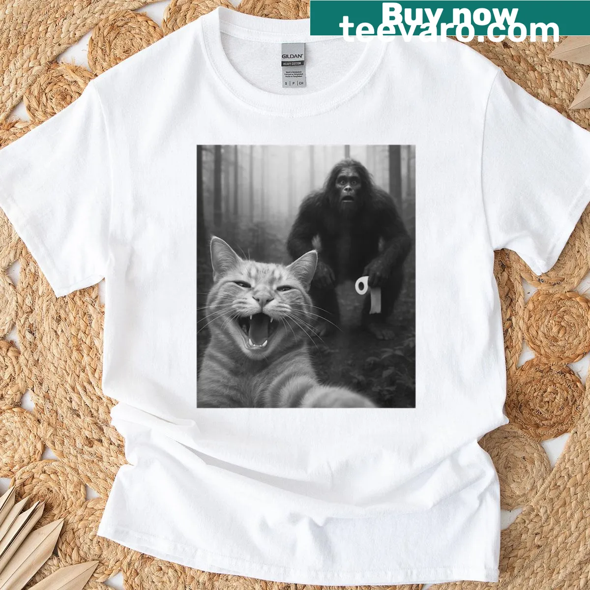 Cartoon cat taking a selfie with Bigfoot — on a men's t-shirt