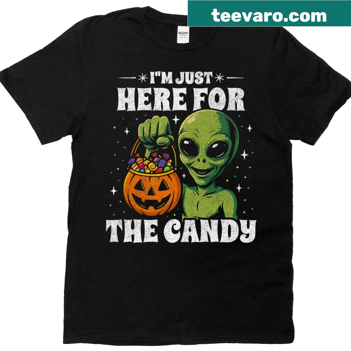 Playful Halloween t-shirt with alien graphic and candy joke. — on a men's t-shirt