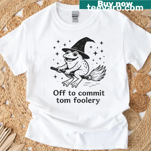 Cartoon frog witch on broom for Halloween T-shirt