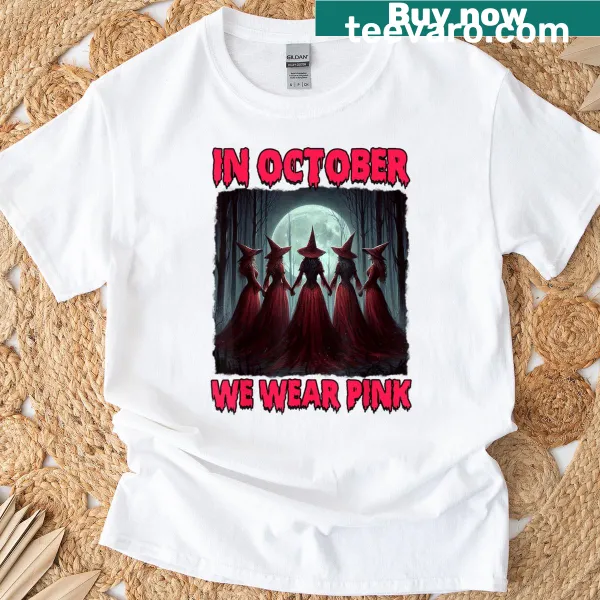 Witch design with 'In October We Wear Pink' text for breast cancer awareness