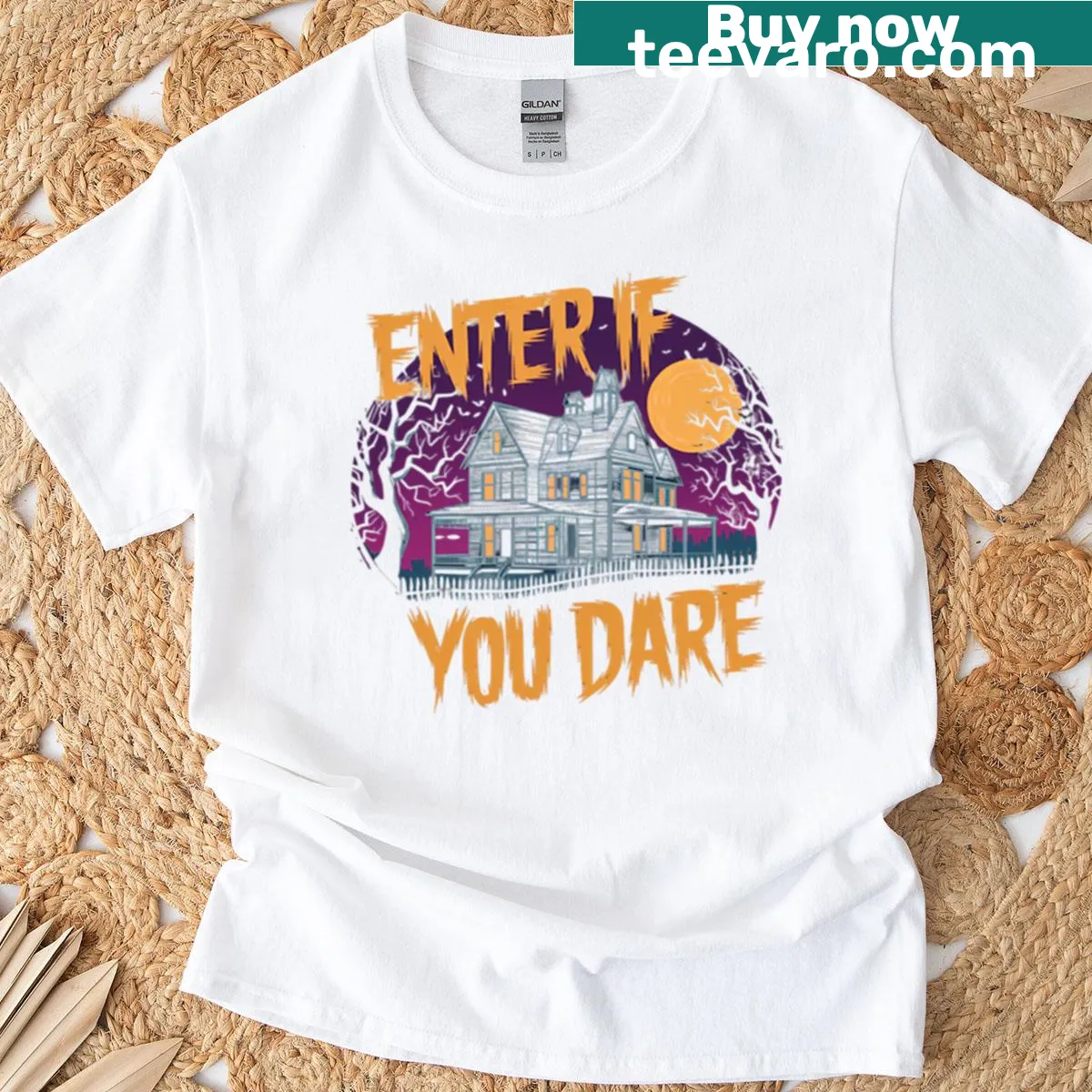 Oversized t-shirt featuring a haunted house silhouette — on a men's t-shirt