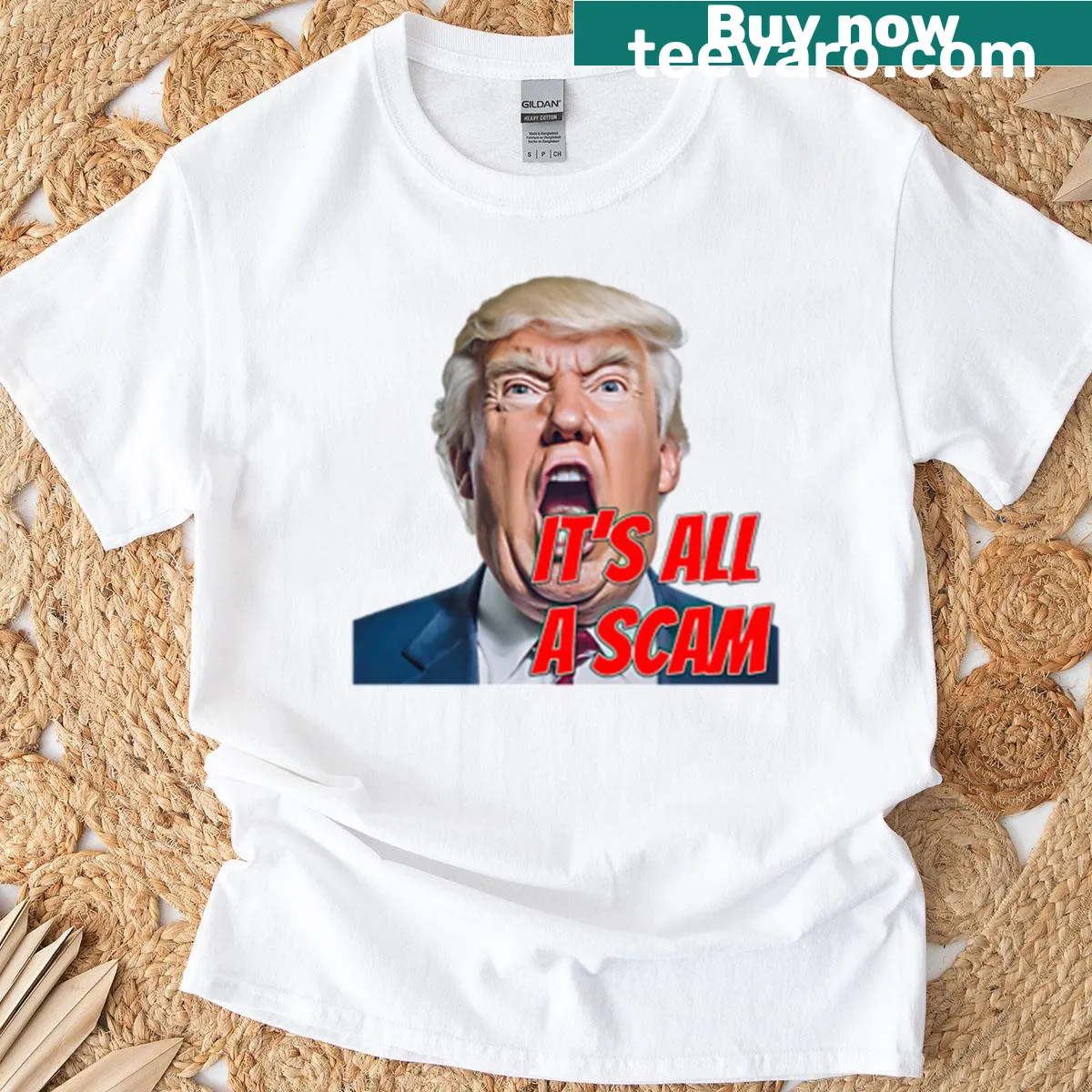 Oversized t-shirt with the phrase 'It's All A Scam.' — on a men's t-shirt