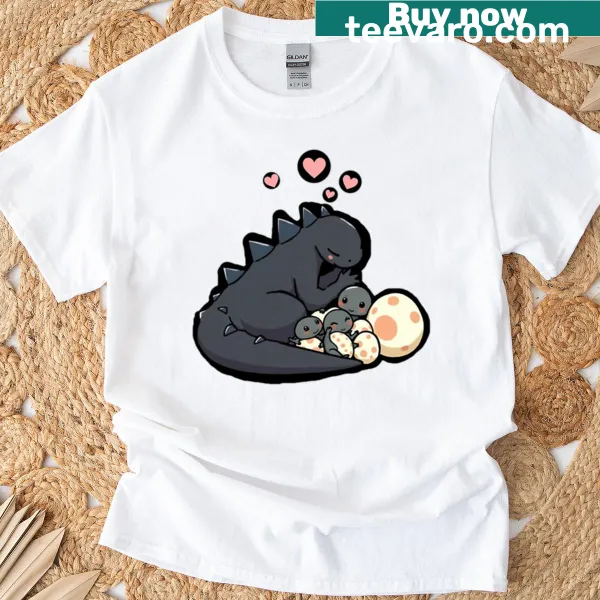 Cartoon kaiju monster and baby eggs graphic on a T-shirt