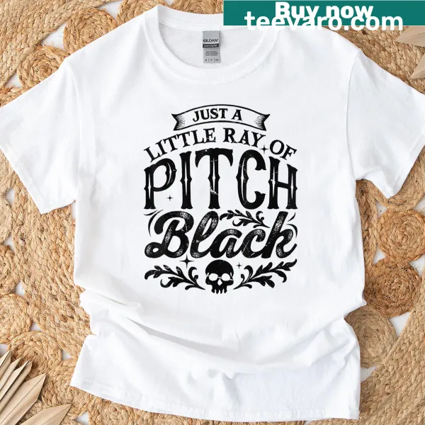 Spooky Halloween t-shirt with the phrase 'Just A Little Ray Of Pitch Black' in bold typography.