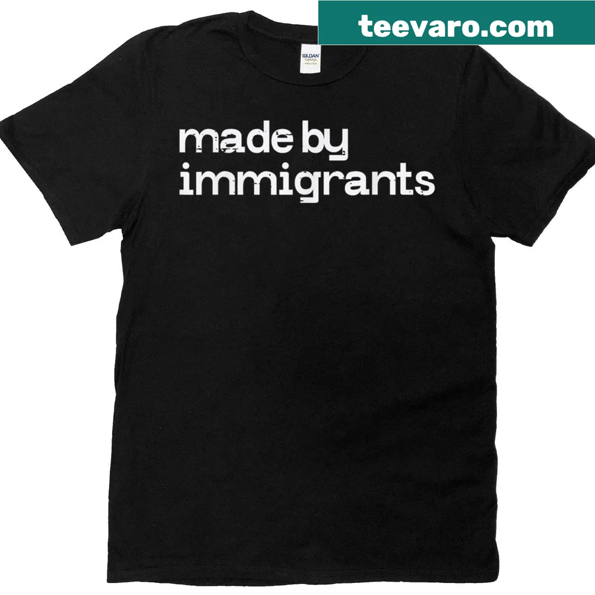 Typography on a T-shirt supporting immigrant rights and pride. — on a men's t-shirt