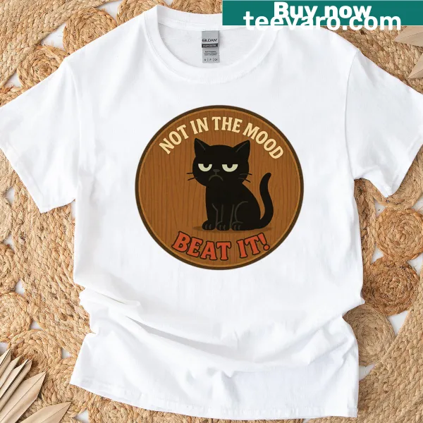 Oversized t-shirt featuring a grumpy black cat and the phrase 'Not In The Mood, Beat It'