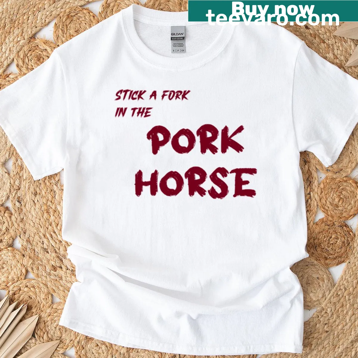 Cartoon graphic of a pig dressed as a horse on an oversized t-shirt — on a men's t-shirt
