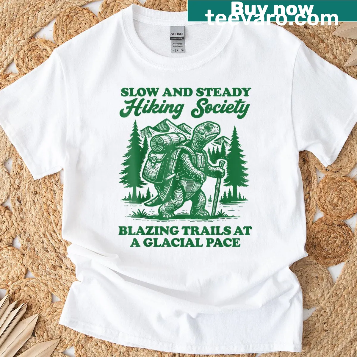 Illustrated t-shirt with 'Slow And Steady Hiking Society' and scenic trails — on a men's t-shirt