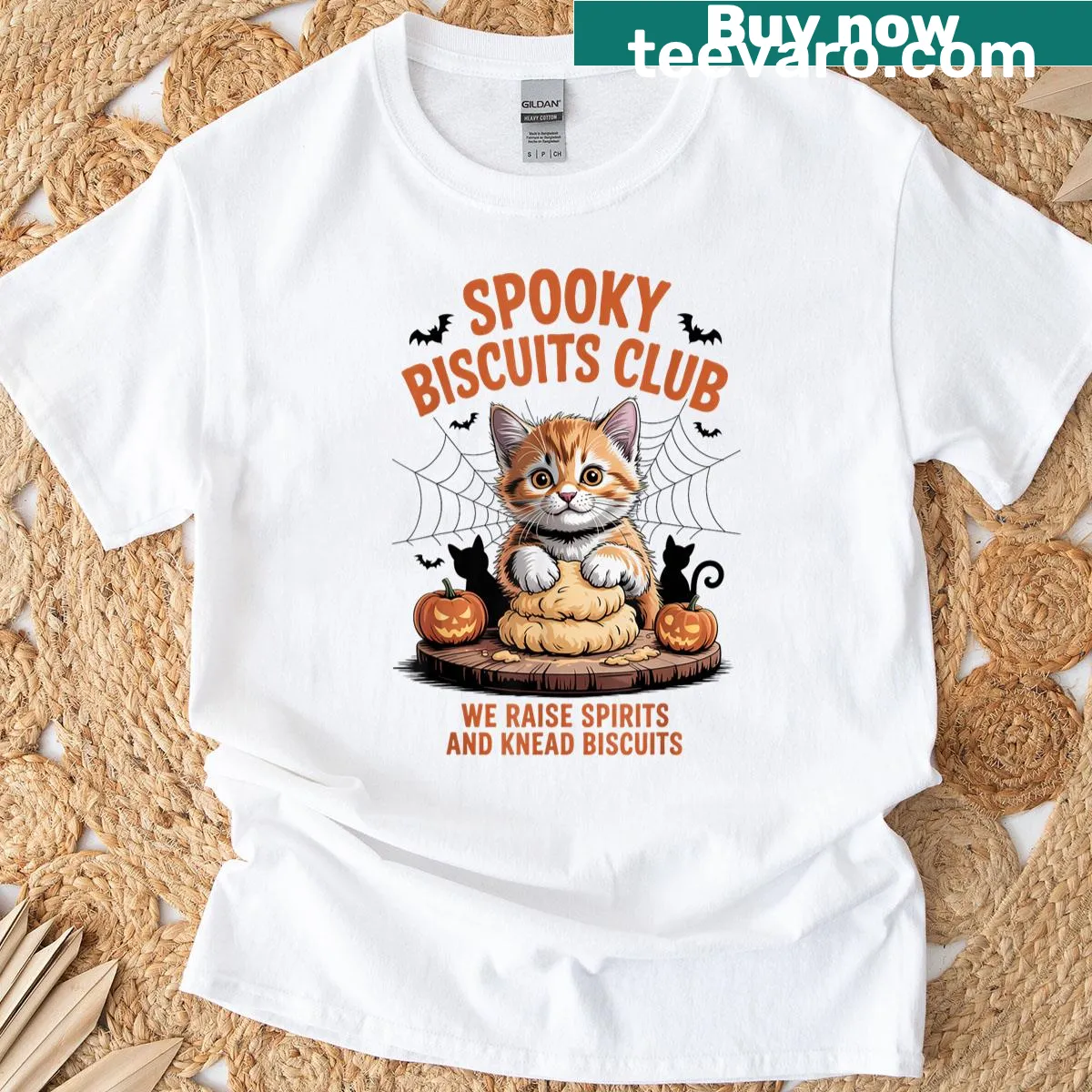Whimsical design of cats baking for Halloween with funny text — on a men's t-shirt