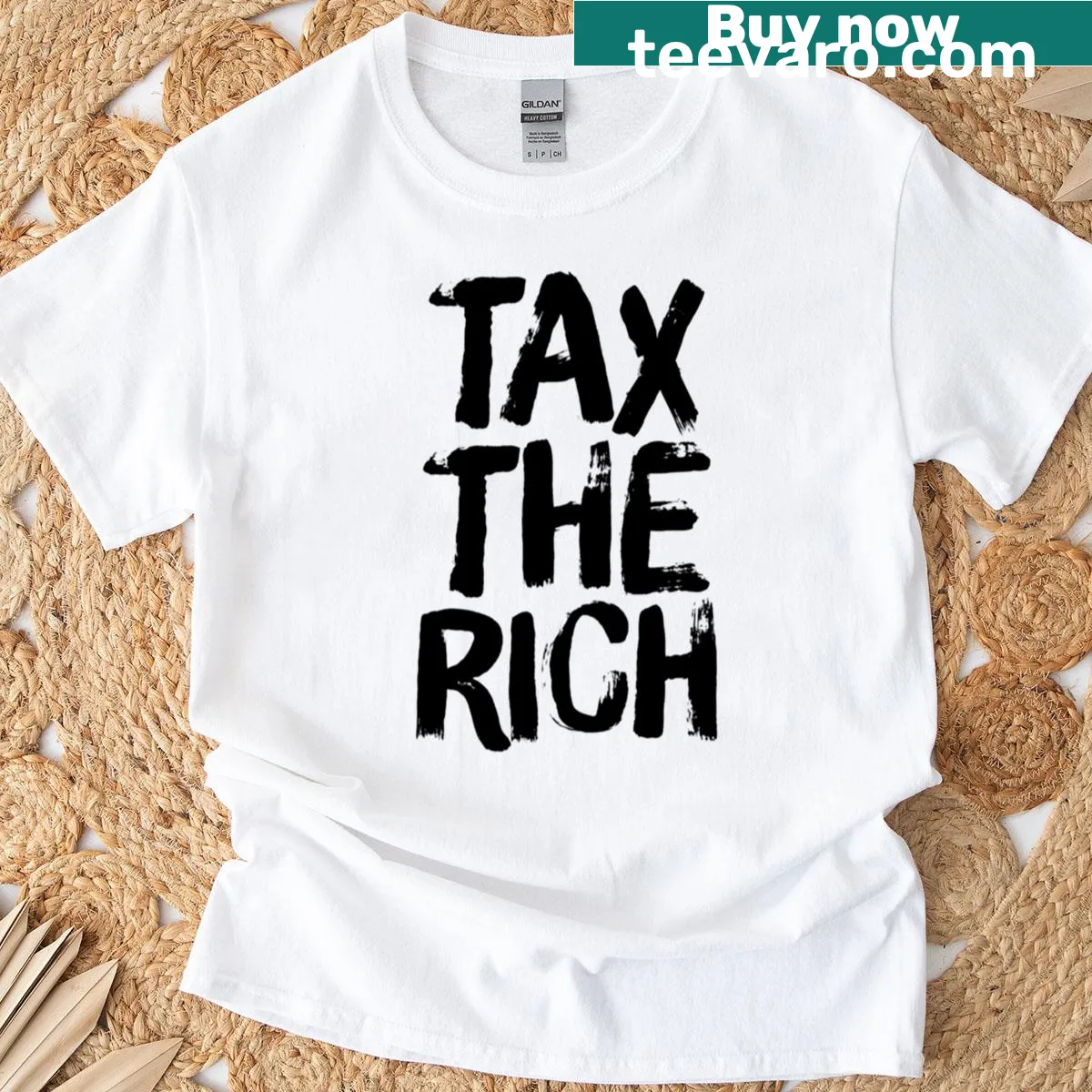 Oversized T-shirt with text 'Tax The Rich' — on a men's t-shirt