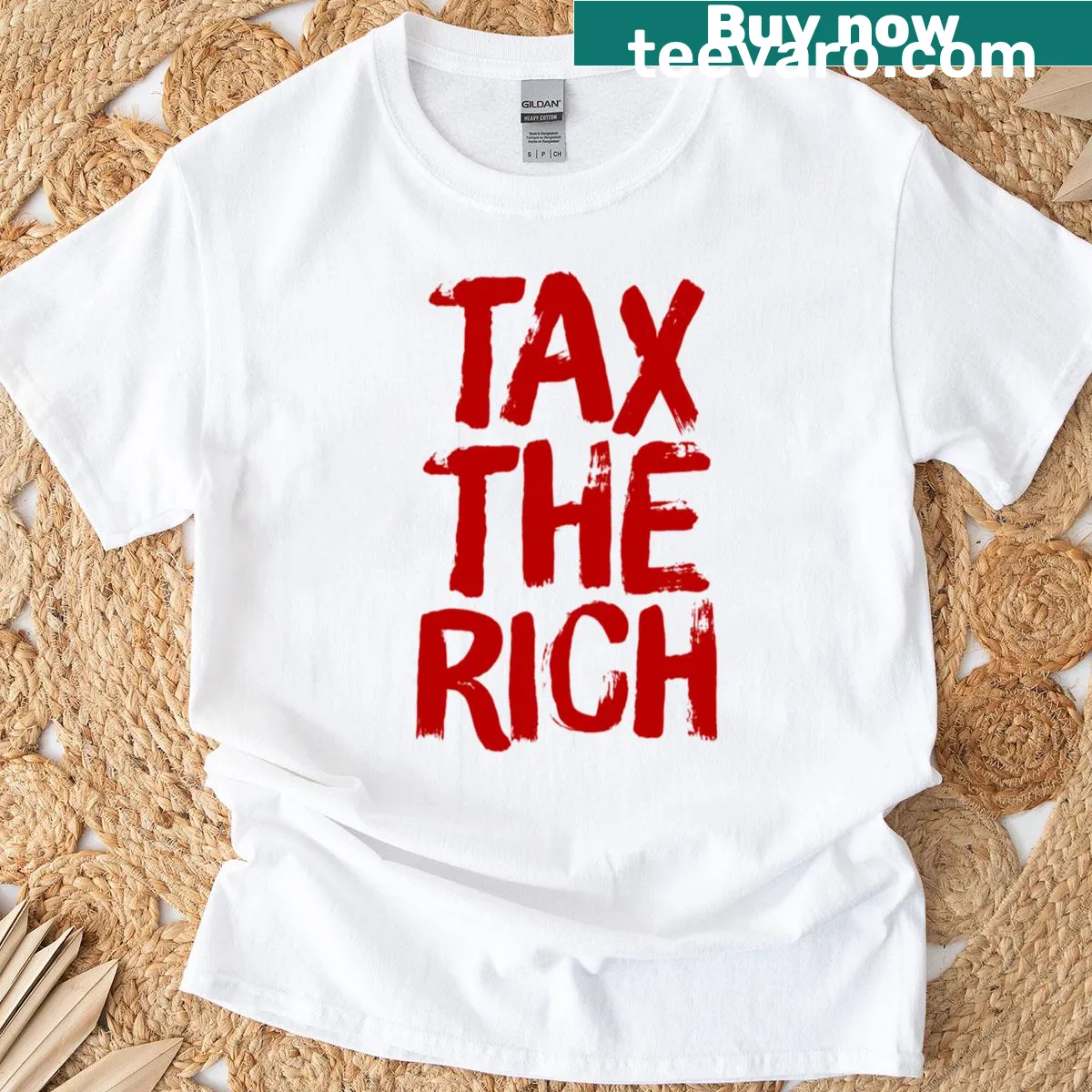T-shirt with text 'Tax The Rich' in bold lettering — on a men's t-shirt