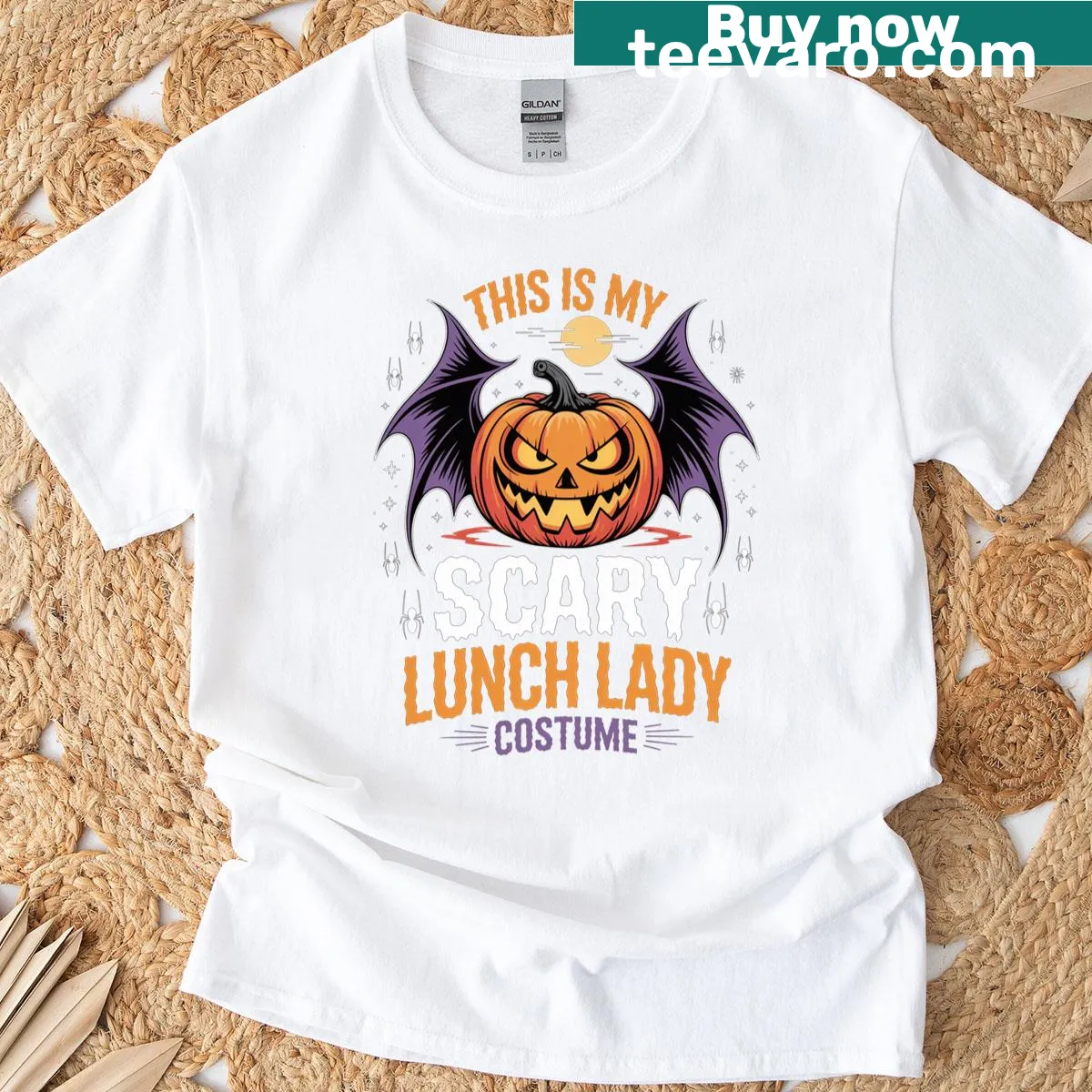 Halloween-themed t-shirt with pumpkin and bat illustration — on a men's t-shirt