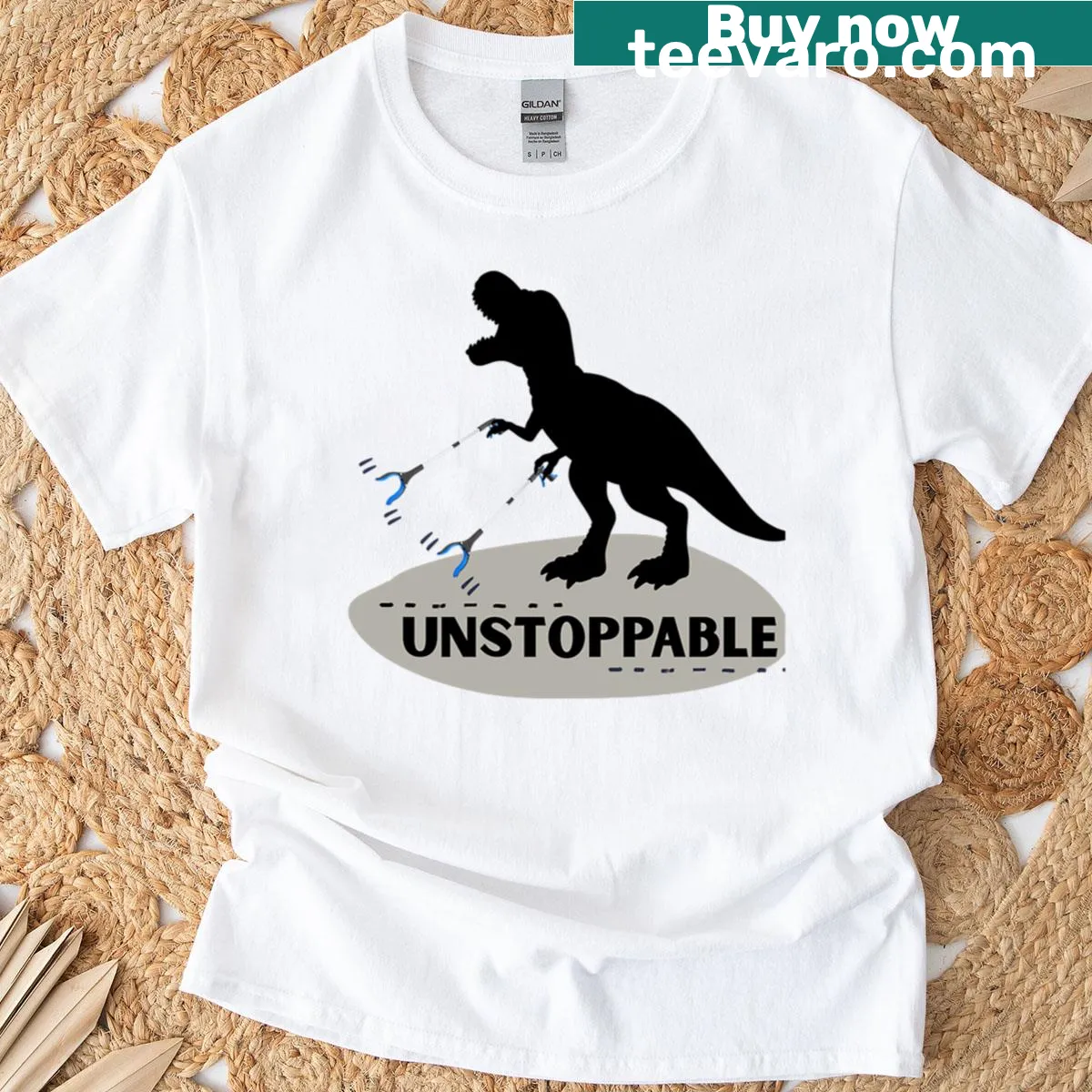 Whimsical T-rex illustration with graby sticks on a playful backdrop — on a men's t-shirt