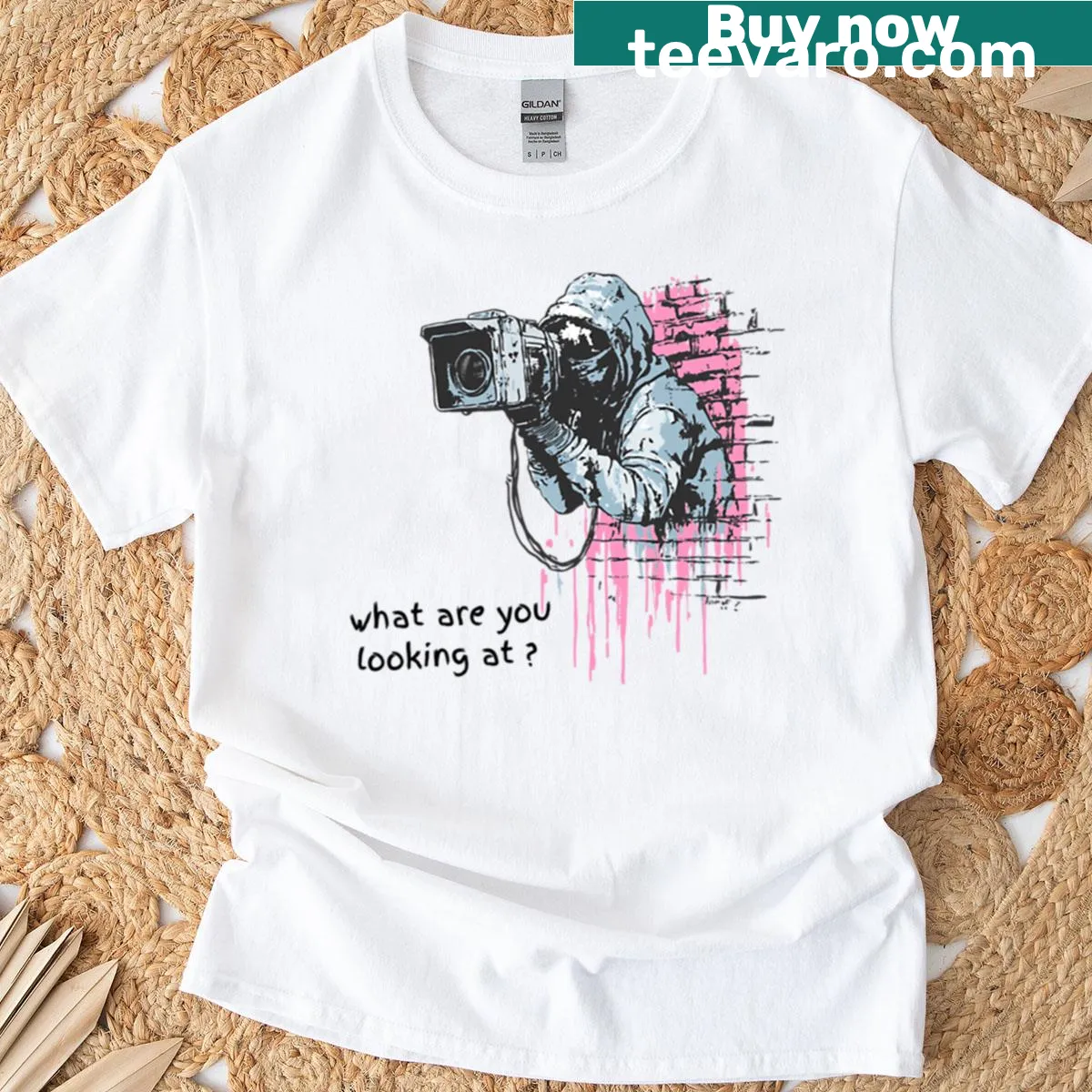 Urban street art t-shirt with bold text asking 'What Are You Looking At' — on a men's t-shirt